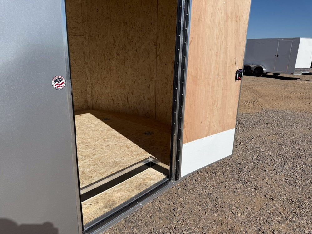 8.5 x 16 Outback DLX Flat Top V Nose Car Hauler (2) - 3500 lbs Axles - Enclosed - TrailerSwap