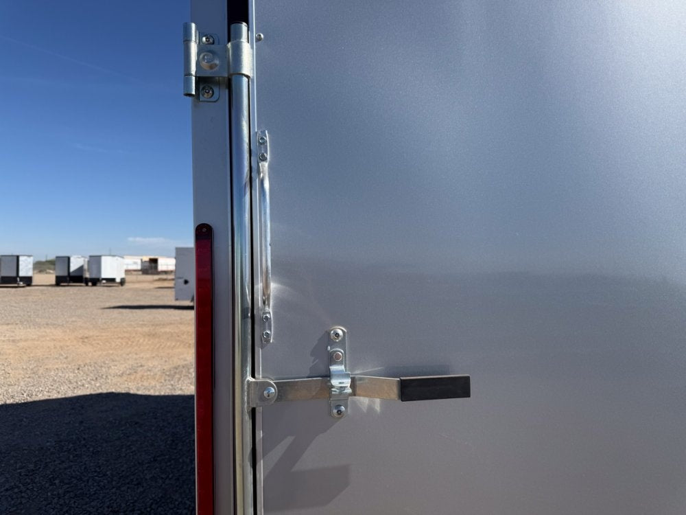 8.5 x 16 Outback DLX Flat Top V Nose Car Hauler (2) - 3500 lbs Axles - Enclosed - TrailerSwap